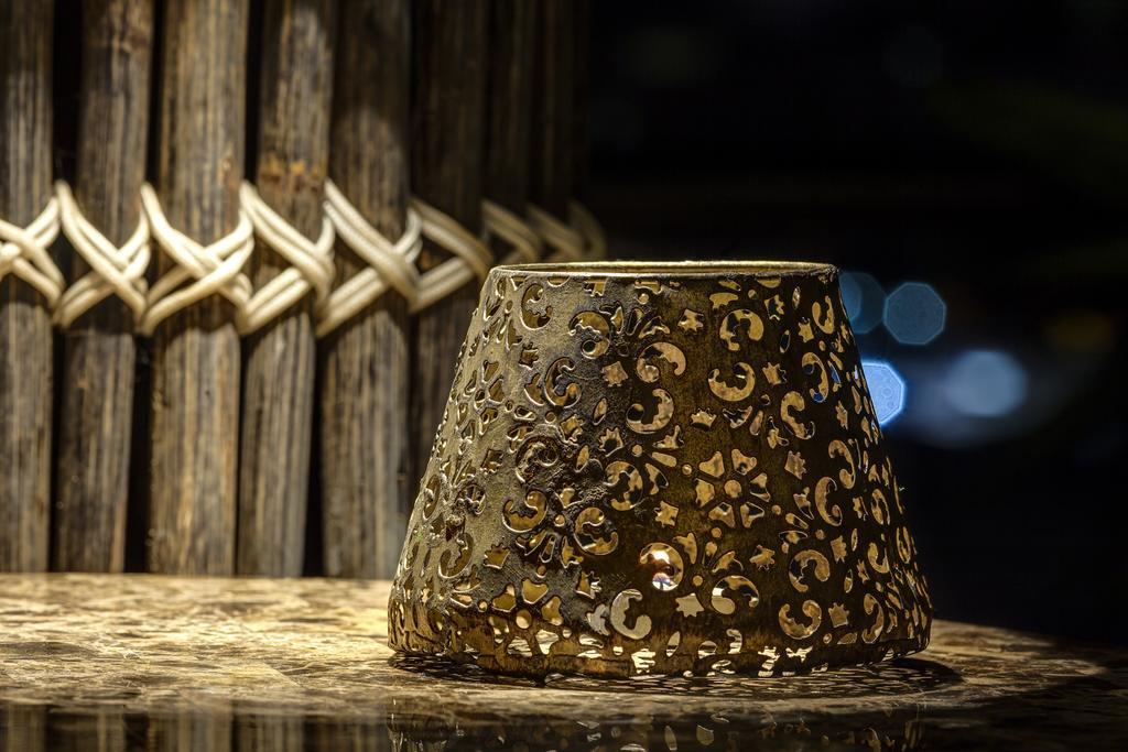 Ghl Hotel Montería Exteriér fotografie A candle holder